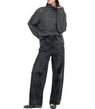 Jeans flare vita alta con spalmature