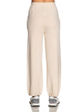 YES-ZEE D Pantaloni palazzo in maglia con logo strass beige