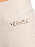 YES-ZEE D Pantaloni palazzo in maglia con logo strass beige